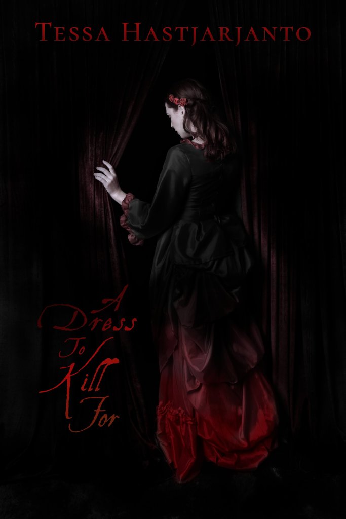 Woman with dark red hair wears a Victorian evening gown made form black satin. The bottom of the skirt is blood red, forming a gradient towards the black. She stands with her back towards the camera and holds open the red velvet curtains, walking through them. Shadows surround the whole image. There's red text at the top, Tessa Hastjarjanto (author), and next to the woman, on the shadowed curtain, A Dress to Kill For.